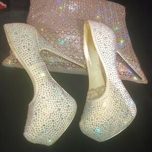 White with iridescent rhinestone heel.